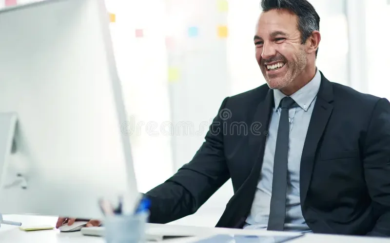 reading-smile-businessman-computer-office-check-email-positive-finance-proposal-feedback-investing-plan-success-445455528